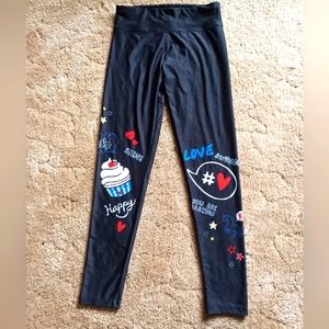 Justice black graphic leggings size 14